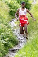 25 May 2024, Thuringia, Oberhof: Winner Samson Tesfazghi Hayalu runs the marathon course near Masserberg at the 51st GutsMuths-Rennsteiglauf 2024. Photo: Michael Reichel/dpa