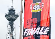 25 May 2024, Berlin: Soccer: DFB Cup, 1. FC Kaiserslautern - Bayer 04 Leverkusen, Final, Olympiastadion. A flag with the words "Final" and the logo of one of the finalists flies in front of the backdrop of the Berlin Radio Tower at the start of the fan festival on Berlin