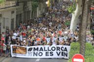 25 May 2024, Spain, Palma: Locals at a demonstration against mass tourism. Thousands have protested against mass tourism in Mallorca. Under the slogan "Let
