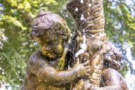 26 May 2024, Saxony, Großenhain: A figure standing in a fountain in the Zabeltitz baroque garden is sprayed with water during the Day of Gardens and Parks in the Dresden region. Parks and gardens in the Dresden region are being presented for the 15th time today. Photo: Frank Hammerschmidt/dpa