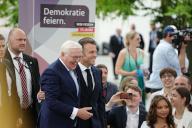 26 May 2024, Berlín;: The presidents of France and Germany, Emmanuel Macron and Frank-Walter Steinmeier, visit an event of the so-called "Festival of Democracy", which commemorates the 75th anniversary of the Basic Law (Constitution). The French president and his wife are on a three-day state visit to Germany at the invitation of his German counterpart. Photo: Kay Nietfeld/dpa