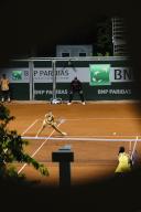 26 May 2024, France, Paris: Tennis: Grand Slam/WTA Tour, French Open, singles, women, 1st round. Xinyu (China) - Niemeier (Dortmund). Jule Niemeier (l) and Xinyu Wang are in action. Photo: Frank Molter/dpa