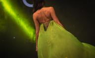 25 May 2024, Argentina, Buenos Aires: A beauty pageant contestant walks across the stage in a green evening gown with a lace-up corset. Photo: Florencia Martin/dpa