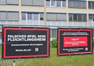 28 May 2024, Brandenburg, Potsdam: Banners from a residents