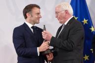 28 May 2024, Münster: French President Emmanuel Macron receives the Westphalia International Peace Prize from German Head of State Frank-Walter Steinmeier. Photo: Rolf Vennenbernd/dpa