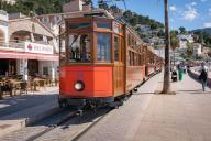23 April 2024, Spain, Puerto De Soller: The historic streetcar between Soller and Puerto de Soller. The streetcar, also known as the "Red Lightning", has been running since 1913. Photo: Frank Rumpenhorst/dpa