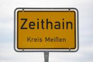 29 May 2024, Saxony, Zeithain: Zeithain Kreis Meißen is written on a place name sign on a road. Photo: Robert Michael/dpa