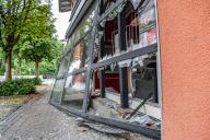 31 May 2024, Baden-Württemberg, Kupferzell: Shattered windows can be seen after an ATM was blown up at a savings bank. Because it was raining heavily, the police helicopter was unable to take off. So far there is no trace of the perpetrators. Photo: Fabian Koss/dpa