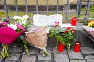01 June 2024, Baden-Württemberg, Mannheim: Candles, flowers and a piece of paper with the inscription "Against Terror" stand at the scene of the crime on the market square. The perpetrator had attacked participants at an anti-Islamic rally on Mannheim