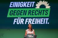 01 June 2024, Brandenburg, Potsdam: Emily Büning, Federal Political Director, speaks at the small party conference of Bündnis 90/Die Grünen in the Schinkelhalle. With a small party conference in Potsdam, around 100 Green Party delegates want to ring in the hot final phase of the European election campaign. Photo: Monika Skolimowska/dpa