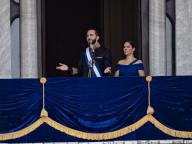 01 June 2024, El Salvador, San Salvador: Nayib Bukele (l), re-elected president of El Salvador, addresses the crowd from the balcony of the National Palace after being sworn in for his second term as president in the capital. Next to him is his wife Gabriela de Bukele. Photo: Juan Carlos/dpa