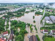 02 June 2024, Bavaria, Pfaffenhofen An Der Ilm: Aerial photographs show the Ilm bursting its banks. It is to be expected that the water levels will continue to rise. Photo: Jason Tschepljakow/dpa