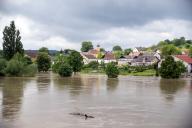 02 June 2024, Bavaria, Weltenburg: View of the village of Stausacker from Weltenburg. Due to the flooding with further rising water levels, a state of emergency has been declared for the district of Kelheim in Lower Bavaria. This was announced by the district administration on Sunday. Photo: Pia Bayer/dpa