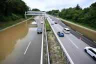 02 June 2024, Bavaria, Allershausen: There is water on the A9 highway near Allershausen. After heavy rainfall, there is high water with flooding in the region. Photo: Felix Hörhager//dpa