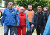 dpatop - 02 June 2024, Bavaria, Babenhausen: Markus Söder (CSU, l-r), Bavarian Minister President, Claudia Roth (Alliance/90 Greens), Minister of State for Culture, and Robert Habeck (Alliance/90 Greens), Federal Minister for Economic Affairs and Climate Protection, arrive for a site inspection in the town affected by the floods. Photo: Karl-Josef Hildenbrand/dpa
