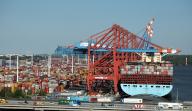 13 May 2024, Hamburg: Containers are handled at Eurogate
