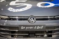 03 June 2024, Lower Saxony, Wolfsburg: A Volkswagen Golf decorated with the words "50 years of Golf" stands at the "50 years of Golf production" ceremony at the VW plant. Photo: Moritz Frankenberg/dpa