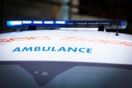 02 June 2024, Lower Saxony, Hanover: Blue light shines on an ambulance. Photo: Moritz Frankenberg/dpa