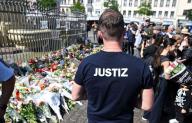 03 June 2024, Baden-Württemberg, Mannheim: After the death of a police officer following a knife attack that left several people injured, flowers and candles are laid in the immediate vicinity of the crime scene on the market square. Photo: Uli Deck/dpa