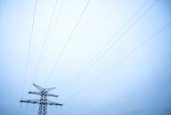29 January 2023, Schleswig-Holstein, Kaltenkirchen: High voltage power lines against gray sky. Photo: Daniel Bockwoldt\/dpa