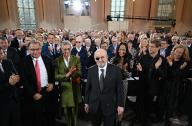 22 October 2023, Hesse, Frankfurt/Main: British-Indian author Salman Rushdie (M) receives a standing ovation at the start of the German Book Trade Peace Prize award ceremony in St. Paul