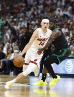 Boston Celtics guard Jrue Holiday (R) defends Miami Heat guard Tyler Herro (L) during the first half of the NBA playoffs round one, game four between the Miami Heat and the Boston Celtics at Kaseya Center in Miami, Florida, USA, 29 April 2024