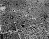 Aerial view of Osaka, Japan, after firebombing by U.S. incendiary bombs. The city suffered three bombing campaigns by B-29 Superfortresses from March to August 1945. The last occurred on Aug. 14, five days after the Atomic bombing of Nagasaki. World War 2. (BSLOC_2014_10_116)
