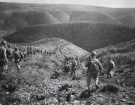 U.S. First Ranger Battalion on a speed march over hilly terrain at Arzew, Algeria, North Africa. Most U.S Troops were 