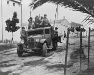 U.S. troops advancing in Oran, North Africa, Nov 18, 1942. They are part of the Central Task Force of Operation Torch that defeated Vichy French forces in Algeria during World War 2. (BSLOC_2014_10_10)