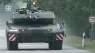 File photo of Leopard 2 A7V battle tank being put through its paces during a road test at the Bundeswehr Technical Center in Meppen. Chancellor Olaf Scholz is under increasing international and domestic pressure to supply German-built Leopard 2 tanks or at least approve their delivery by third countries as a meeting of Ukraine