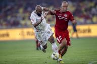Florent Sinama of Liverpool Reds (L) and Mikael Silvestre of Manchester Reds in action during the Battle Of The Reds match between Manchester Reds and Liverpool Reds at National Stadium Bukit Jalil in Kuala Lumpur, Malaysia on April 27, 2024. (EyePress Newswire/FL Wong