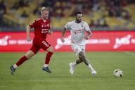 Erik Nevland of Manchester Reds (L) and Jermaine Pennant of Liverpool Reds in action during the Battle Of The Reds match between Manchester Reds and Liverpool Reds at National Stadium Bukit Jalil in Kuala Lumpur, Malaysia on April 27, 2024. (EyePress Newswire/FL Wong