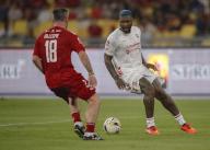 Keith Gillespie of Manchester Reds (L) and Djibril Cisse of Liverpool Reds in action during the Battle Of The Reds match between Manchester Reds and Liverpool Reds at National Stadium Bukit Jalil in Kuala Lumpur, Malaysia on April 27, 2024. (EyePress Newswire/FL Wong