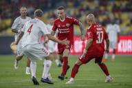 Dimitar Berbatov (C), Danny Webber (R) of Manchester Reds and Jason Mcateer of Liverpool Reds (L) in action during the Battle Of The Reds match between Manchester Reds and Liverpool Reds at National Stadium Bukit Jalil in Kuala Lumpur, Malaysia on April 27, 2024. (EyePress Newswire/FL Wong