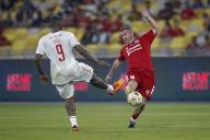 Djibril Cisse of Liverpool Reds (L) and Keith Gillespie of Manchester Reds in action during the Battle Of The Reds match between Manchester Reds and Liverpool Reds atNational Stadium Bukit Jalil in Kuala Lumpur, Malaysia on April 27, 2024. (EyePress Newswire/FL Wong