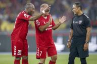 Eric Djemba Djemba (L) and Clayton Blackmore (C) of Manchester Reds argue with match referee during the Battle Of The Reds match between Manchester Reds and Liverpool Reds at National Stadium Bukit Jalil in Kuala Lumpur, Malaysia on April 27, 2024. (EyePress Newswire/FL Wong