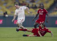 David Thompson of Liverpool Reds (L) and Dimitar Berbatov of Manchester Reds (R) in action during the Battle Of The Reds match between Manchester Reds and Liverpool Reds at National Stadium Bukit Jalil in Kuala Lumpur, Malaysia on April 27, 2024. (EyePress Newswire/FL Wong