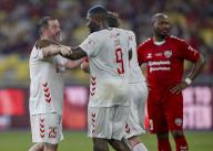 David Thompson (L) and Djibril Cisse (C) of Liverpool Reds celebrate after scoring a goal during the Battle Of The Reds match between Manchester Reds and Liverpool Reds at National Stadium Bukit Jalil in Kuala Lumpur, Malaysia on April 27, 2024. (EyePress Newswire/FL Wong