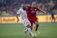 Florent Sinama of Liverpool Reds (L) and Mikael Silvestre of Manchester Reds in action during the Battle Of The Reds match between Manchester Reds and Liverpool Reds at National Stadium Bukit Jalil in Kuala Lumpur, Malaysia on April 27, 2024. (EyePress Newswire/FL Wong