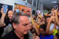 MACEIÃ, AL - 26.12.2023: BOLSONARO EM MACEIÃ - A significant number of Bolsonaro supporters from Maceio took advantage of Jair Bolsonaro&amp;#39;s arrival in Alagoas to welcome him at Zumbi dos Palmares airport. The former president was welcomed with a party on Tuesday night (26) upon landing in the state. (Photo: GUIDO JR./Fotoarena