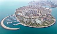 An aerial view of an artificial island named Starlight in Qingdao in east China\'s Shandong province Friday, April 19, 2024. The island, developed by Wanda Group, features theatres, luxury hotels, condo buildings and other tourism or leisure attractions