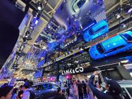 People tour in the booth of LYNK &amp; CO, a Chinese automaker, during the Beijing Auto Show in Beijing, China Friday, May 03, 2024