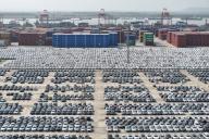 An aerial view of new cars waiting for transportation in a port on the Yangtze River in Nanjing in east China