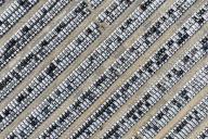 An aerial view of new cars waiting for transportation in a port on the Yangtze River in Nanjing in east China