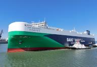 The ro-ro ship SAIC Anji Eternity arrives at the dock to carry new cars for export in Yantai in east China