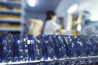 A line of resin optical lenses at a plant in Linhai city in east China