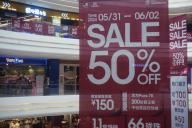A big promotional sign of &quot;Sale 50% Off&quot; at a shopping mall in Hangzhou in east China\'s Zhejiang province Sunday, June 02, 2024. Retail sales in China rose by 2.3% in April from a year ago, slowed from the 3.1% pace reported in March