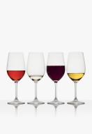 Glasses of red, white and rose wine on white background