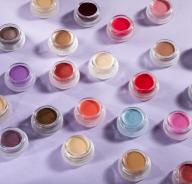 Eye shadow makeup in round glass containers
