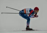 Noah Hoffmann of the United States in action during the FIS cross country World Cup in Davos, on December 10th, 2017. Photo: Gunter Schiffmann/GASPA